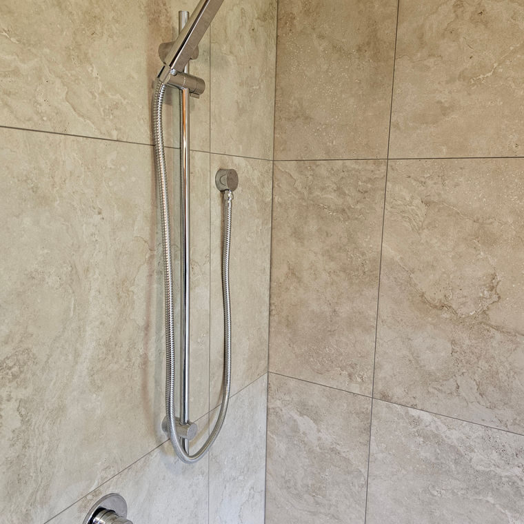New shower and tiled walls