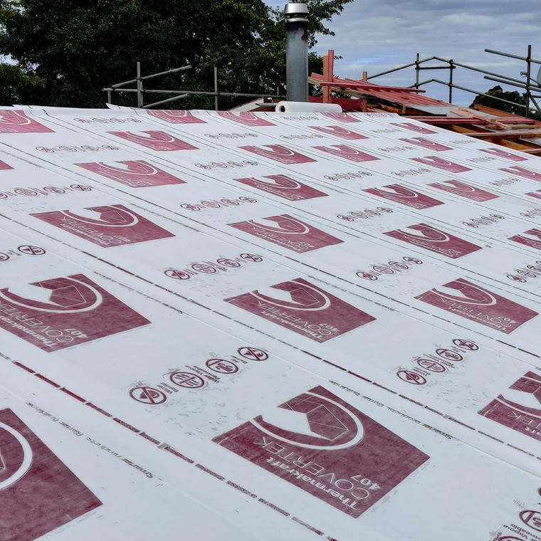 Install roofing paper